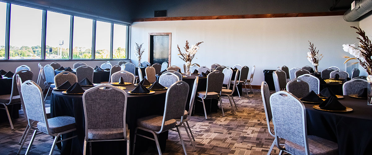 Reception hall with tables and chairs