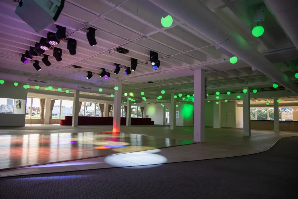 Dallas event venue - Imagen's radiant dance floor with dazzling stage lights