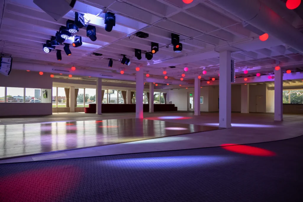 Dallas event venue - Imagen's wall adorned with numerous windows for panoramic views