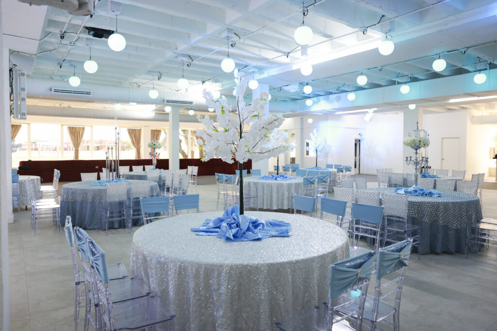 Opulent table arrangement with transparent luxury chairs in Dallas venue