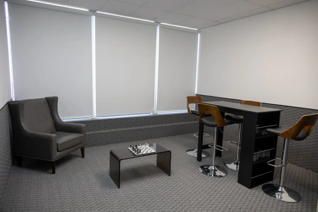 Dallas event venue - Imagen's private room with chess board, high table, and chairs