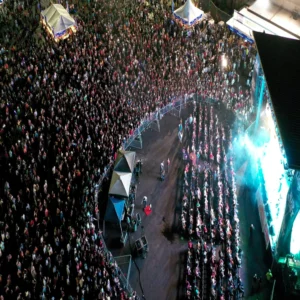 Outdoor audience gathered near stage at Imagen Venues in Houston