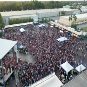 Large outdoor crowd event at Imagen Venues in Houston