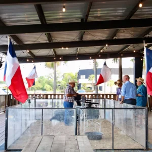 Armadillo race setup with Texas flags at Imagen Venues, a turn-key corporate event venue in Houston
