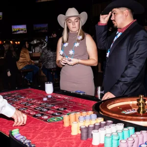 Guests playing roulette at Imagen Venues, a turn-key corporate event venue in Houston