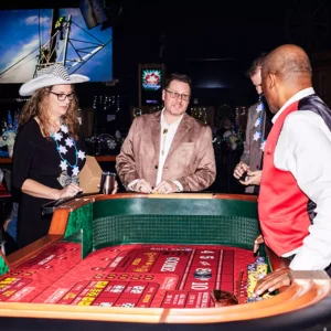 Guests enjoying casino tables at Imagen Venues, a turn-key corporate event venue in Houston