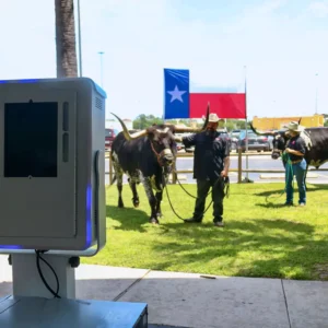 Texas longhorns with photo booth setup at Imagen Venues, a corporate event venue in Houston