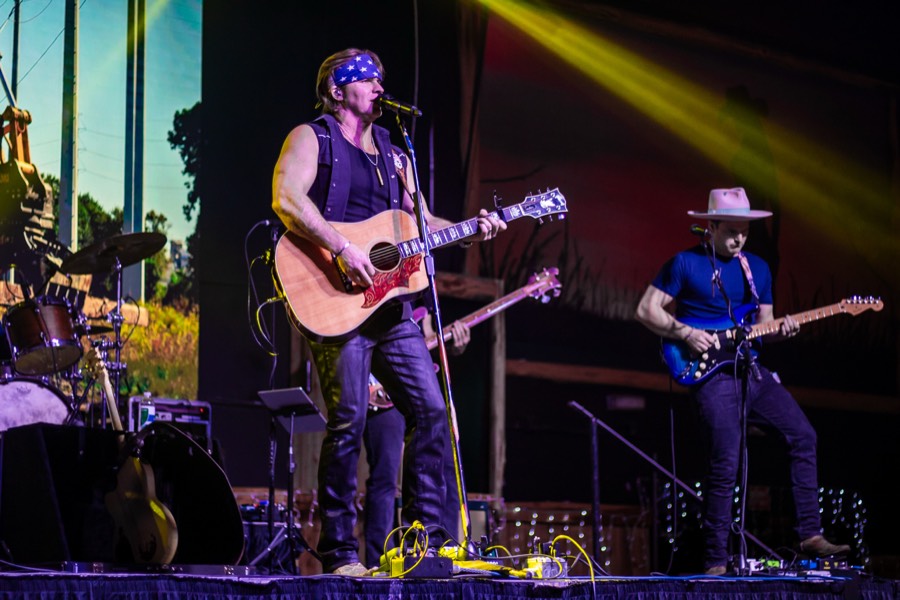 Live entertainment on stage at a Houston company holiday party