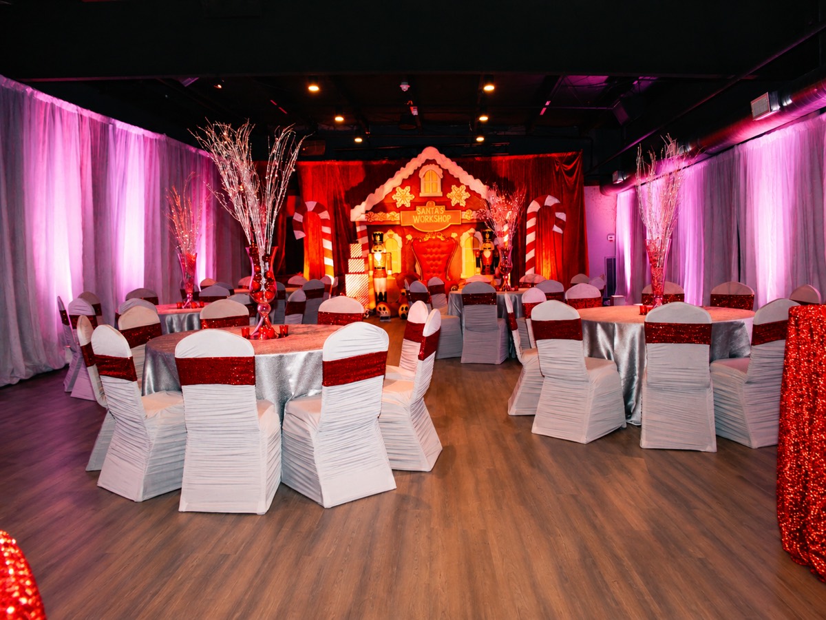 Santa's Workshop themed holiday party setup with candy canes and nutcrackers in the Lonestar Room